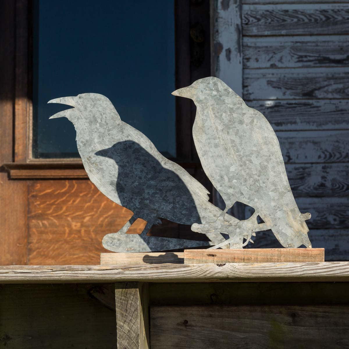 Tin Crows on Wooden Base